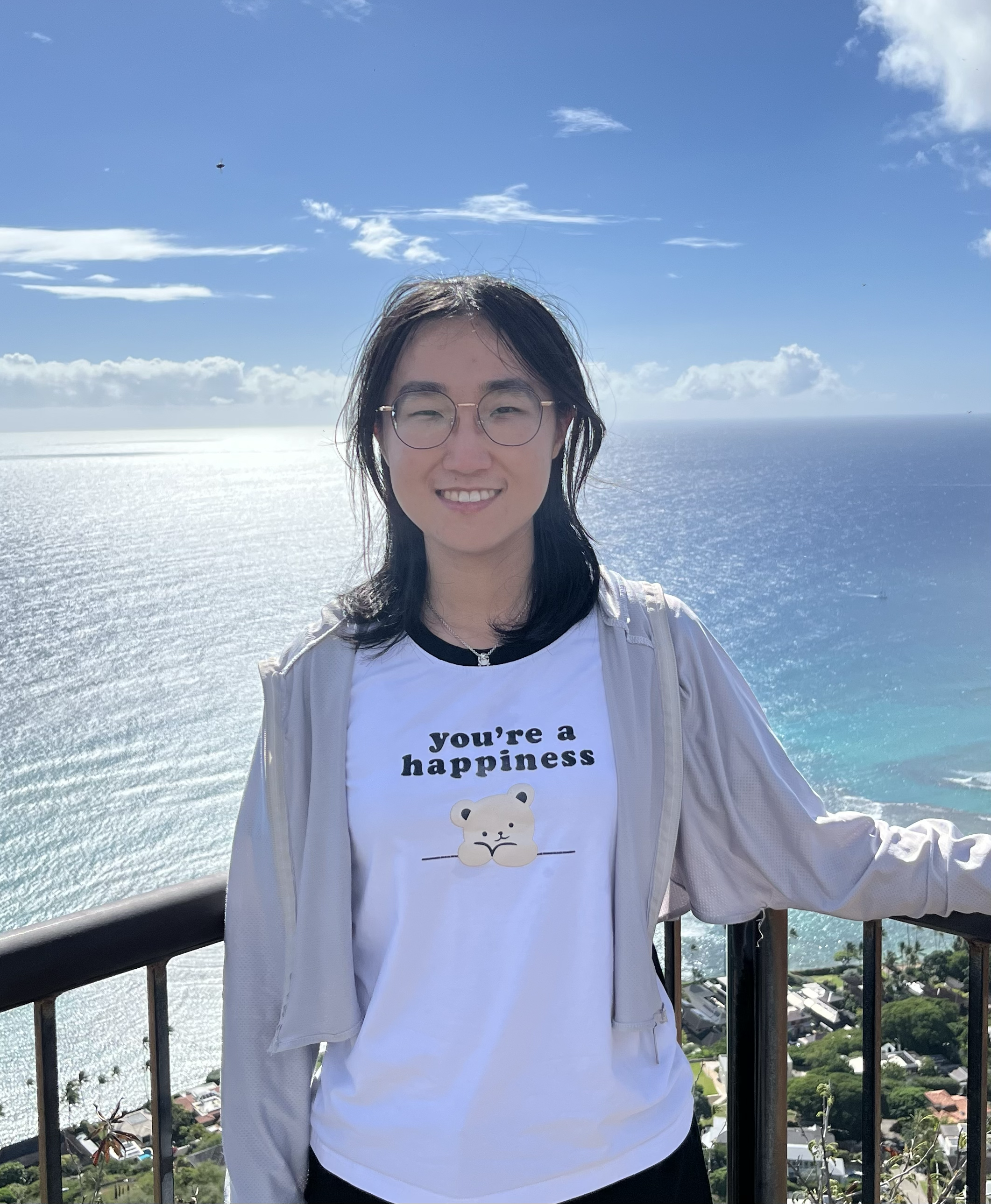 Yuyan Wu standing beside the ocean